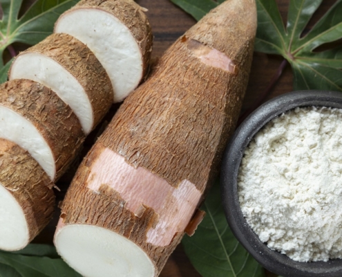 Raw yucca starch and tapioca on the wooden table.