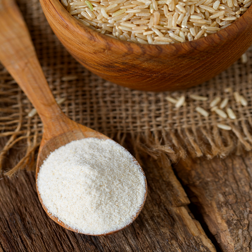 Rice drink powder on a wooden spoon.