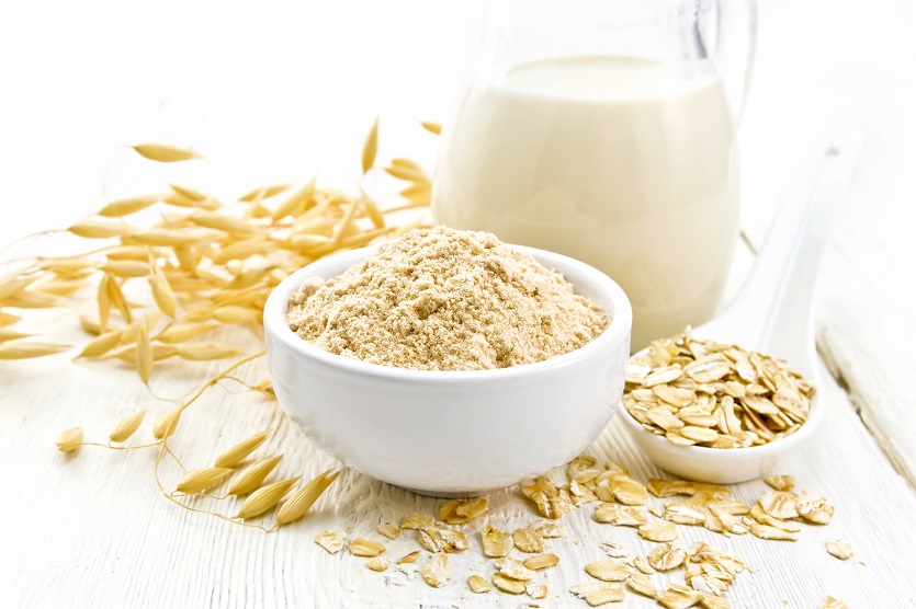 Oat Powder in a Bowl with Milk beneath.